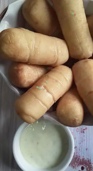 Docena de tequeños con salsa