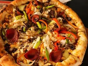 Pizza rebelde chica 4 porcione
