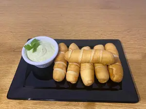 Tequeño de jamón y queso
