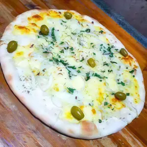 Fugazaseta muza, cebolla verdo