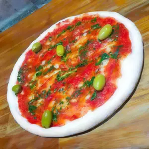 Pizza a la cancha ajo y perejil sin muzzarella