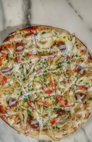 Pizza fugazzeta y panceta