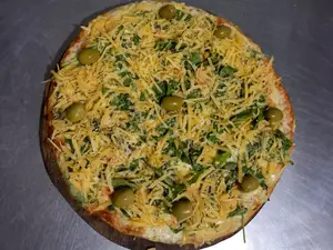 Pizza con Rúcula y Parmesano