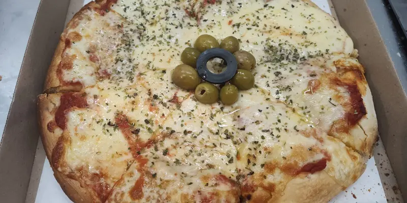 Una Masa Pizzas