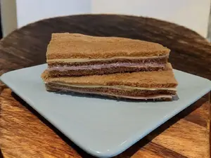 Triple de jamón y queso negro