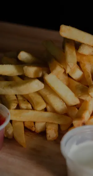 Fritas c/ cheddar y panceta
