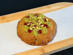 Cookie de Pistacho, chocolate blanco y frambuesa