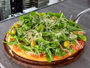 Pizza napolitana con rúcula